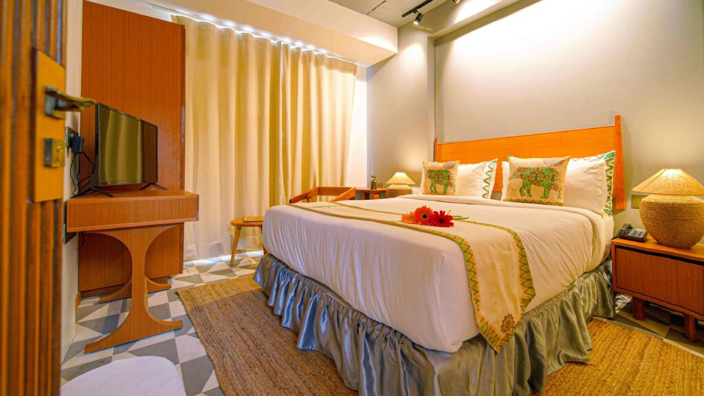 Image showcasing our stylish Matte Suite Room, providing a comfortable and enjoyable experience for our guests, Hotel Nova Boutique Rajkot
